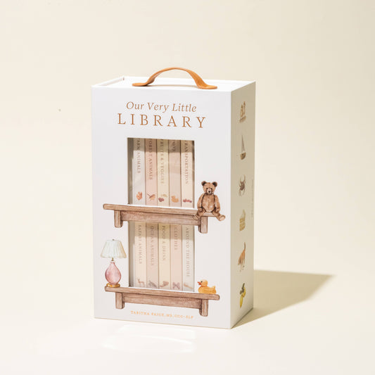 A board book set designed for babies, featuring watercolor illustrations and a bookshelf-inspired carrying case.