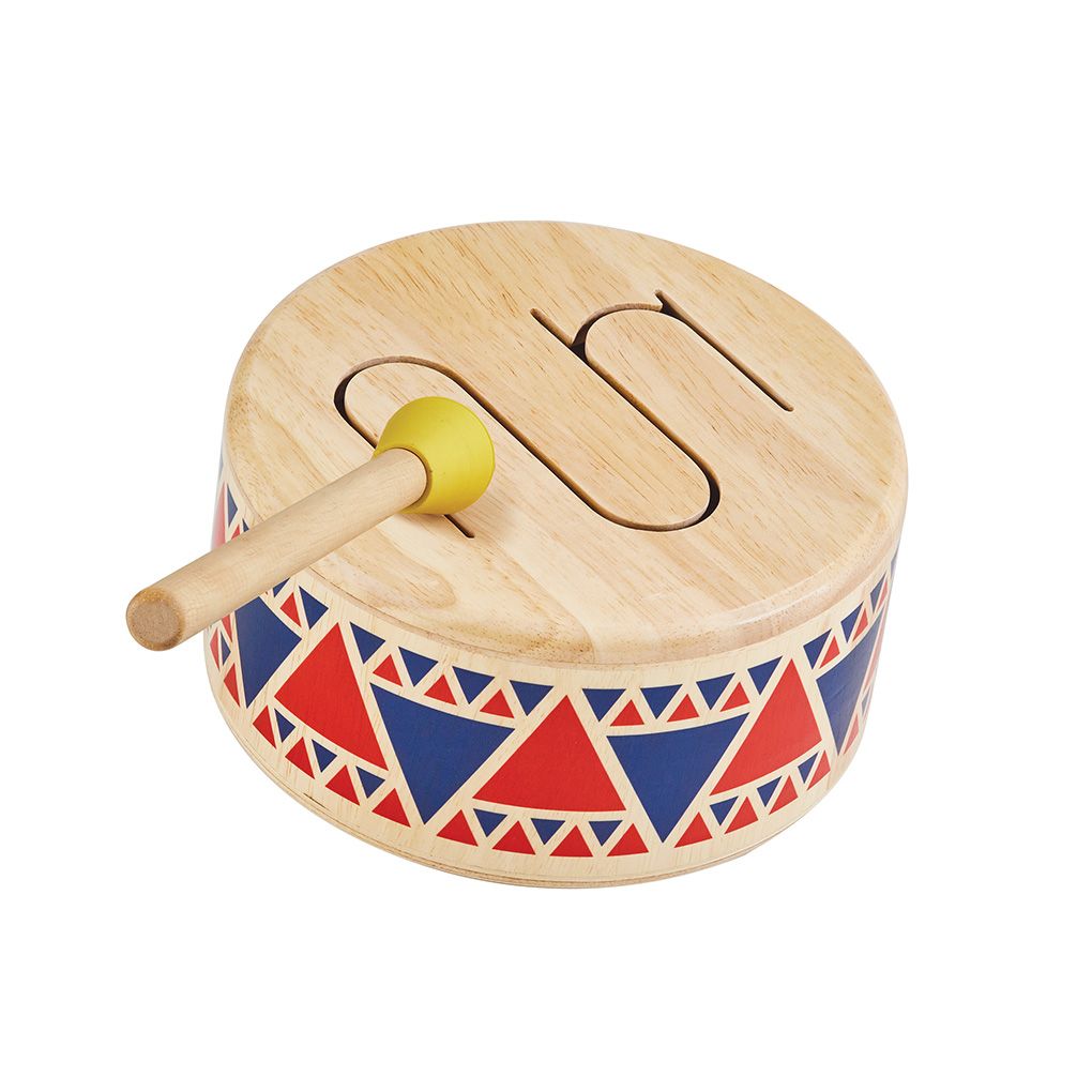 Wooden drum with colorful patterns and a yellow handle on a white background