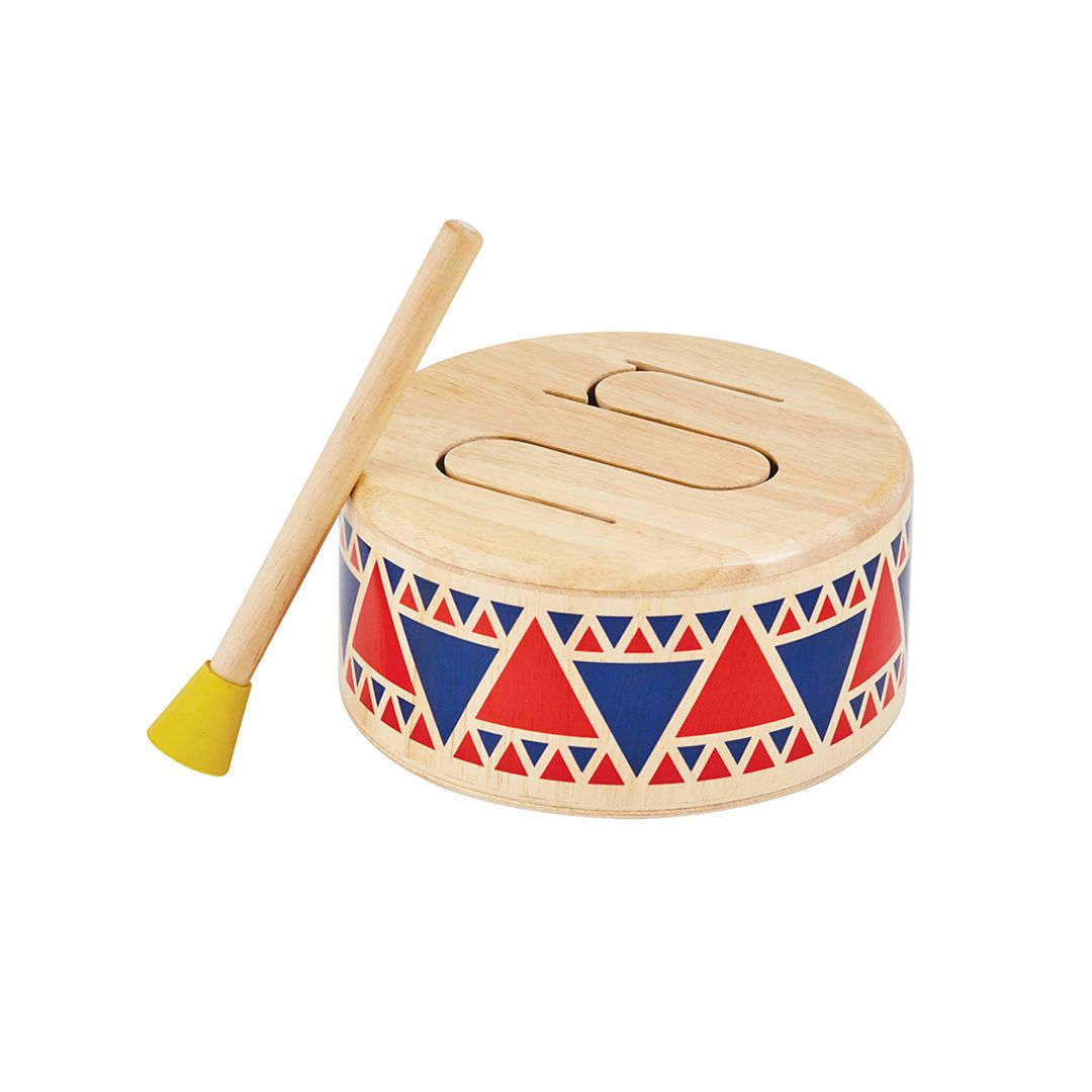 Wooden drum with red and blue triangle patterns and a drumstick on a white background