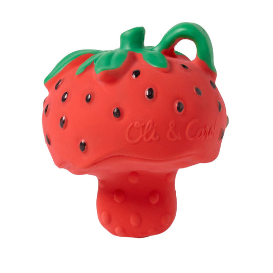 A red strawberry-shaped mini-teether with a green stem and the text 'OLD & CAROL' on it.