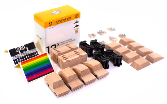 Wooden car model building set with packaging on a white background