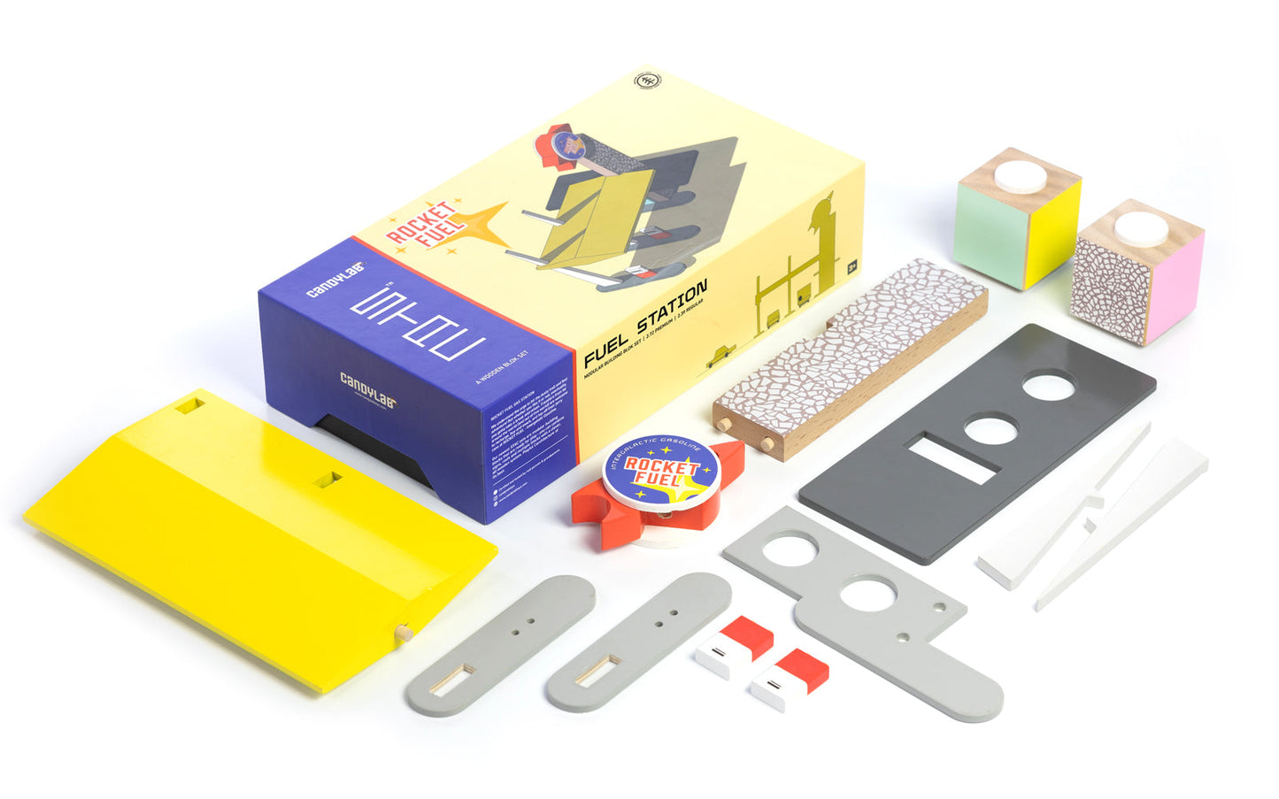 Collection of model building parts and packaging on a white background