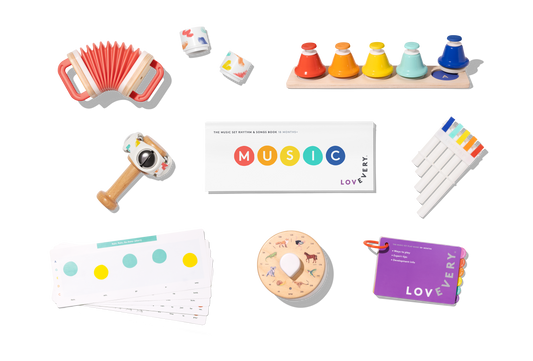 Collection of educational toys and materials for music learning on a white background