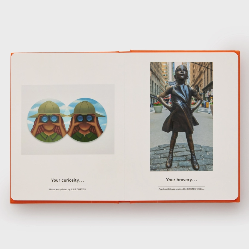 Open book with two images: left with cartoon character earrings, right with a statue of a woman with outstretched arms.