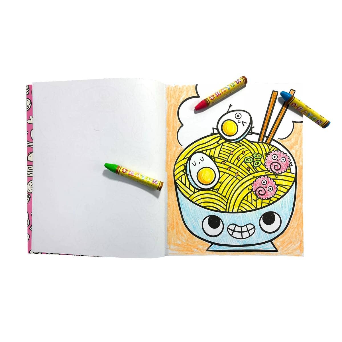 A colored in page of ramen noodles and eggs in a bowl with chopsticks and 3 scattered crayons on the page.
