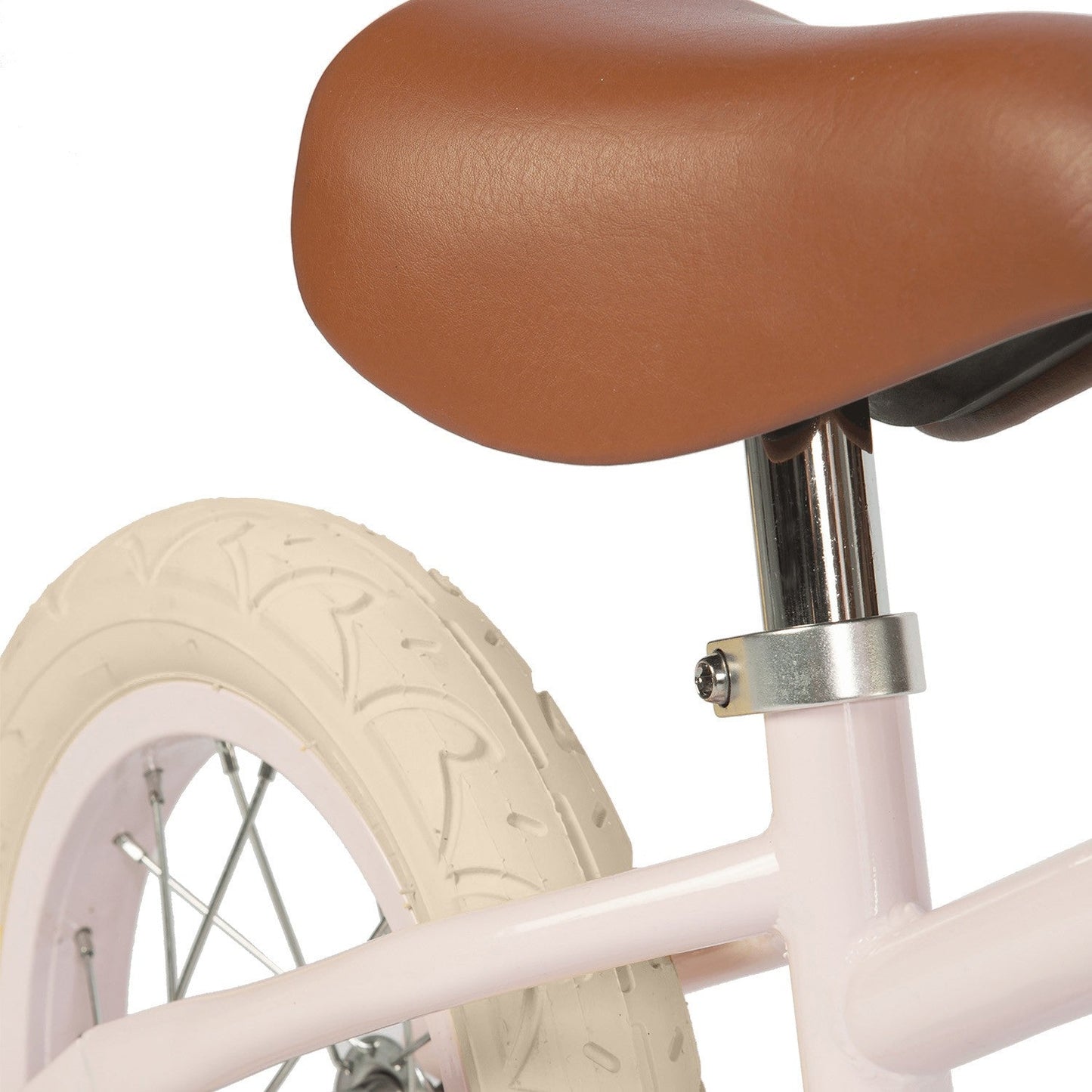 Close-up of a bicycle seat and wheel on a white background