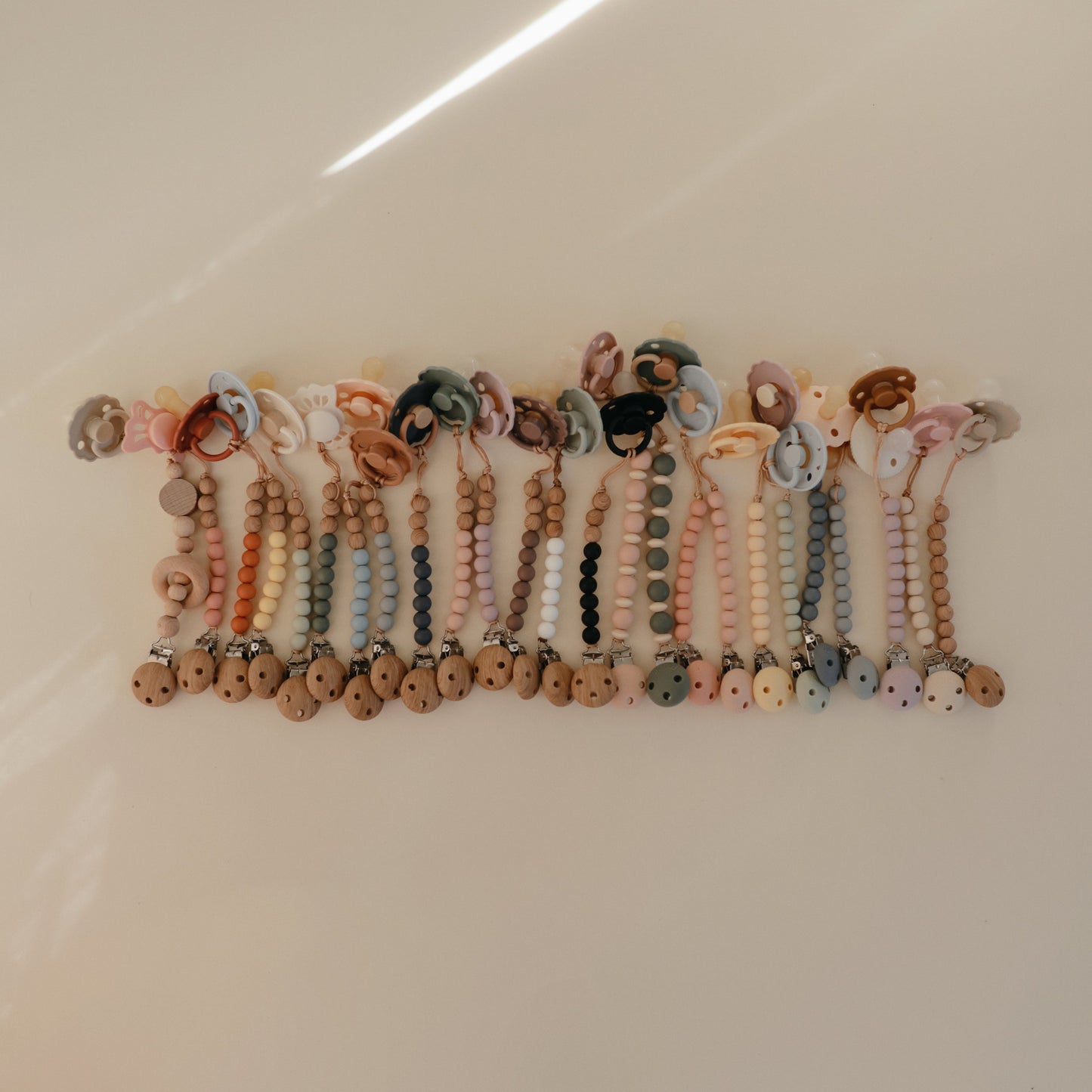 Mushie Silicone Pacifier Clip – Mila