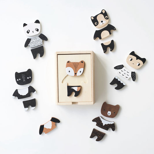 Wooden animal toys with a box on a white background