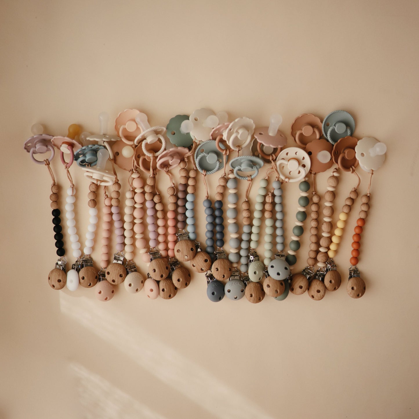 Mushie Silicone Pacifier Clip – Mila