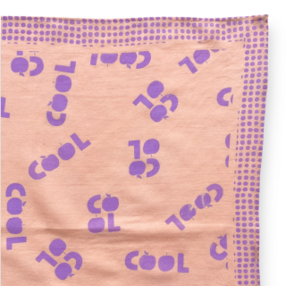Beige fabric with purple text and numbers pattern