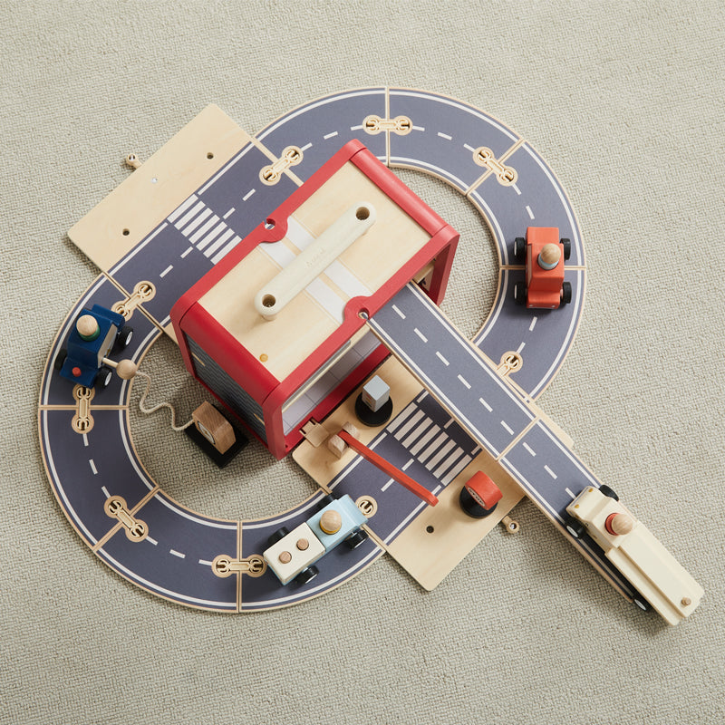 Toy train set with tracks on a textured surface