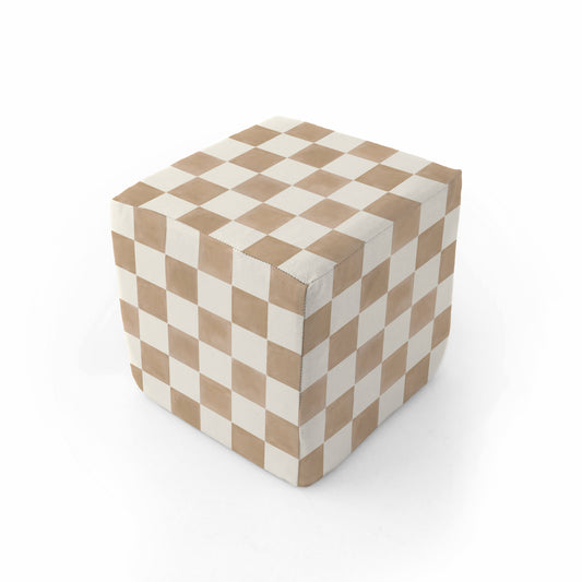 Checkered cube ottoman with brown and white pattern on a white background