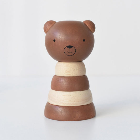 Wooden toy stacker with bear design on a white background