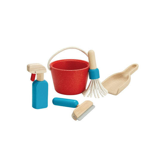 Set of colorful toy cleaning tools including a red bucket, broom, brush, and spray bottle on a white background.