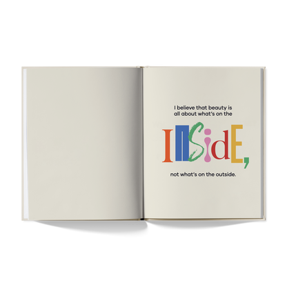Open book with colorful text on a white background