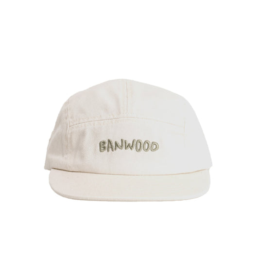 Beige cap with 'Banwood' branding on a white background