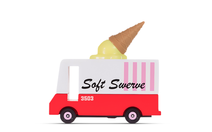 Toy ice cream truck with a cone on top against a white background