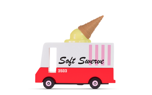 Toy ice cream truck with a cone on top against a white background
