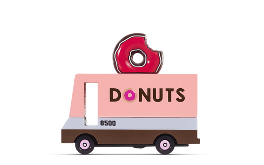 Cartoon donut delivery truck with 'DONUTS' on a white background