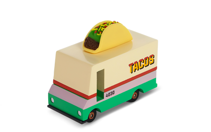 Toy taco truck with a taco on top against a white background
