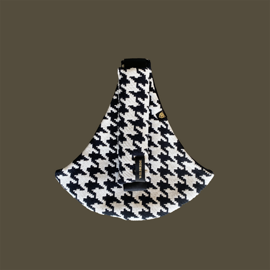 Houndstooth patterned dog muzzle on a brown background