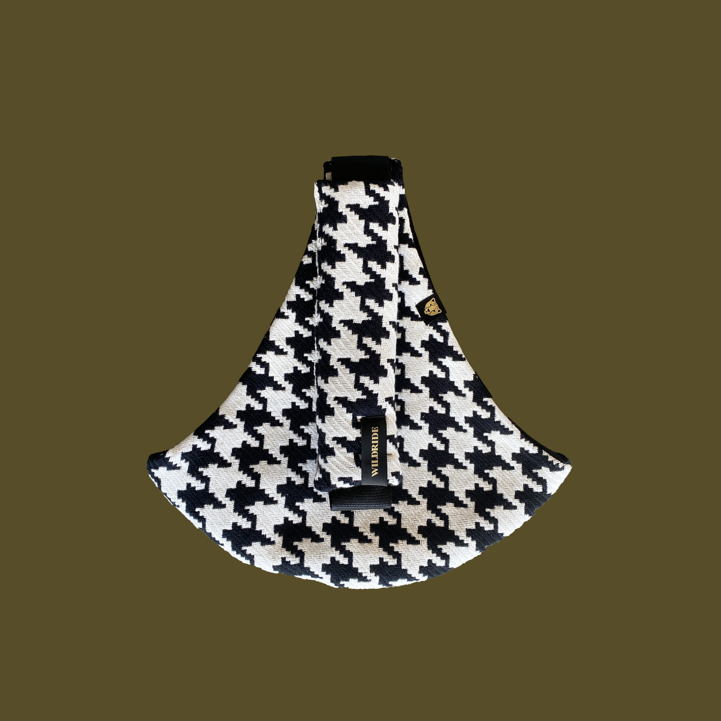 Houndstooth patterned product on a brown background