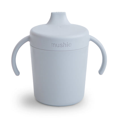 Light blue sippy cup with handles on a white background