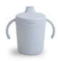 Light blue sippy cup with handles on a white background