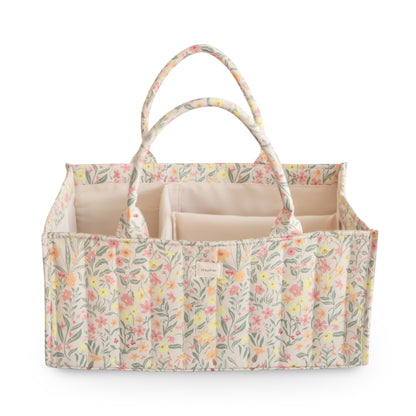 Floral-patterned tote bag with compartments on a white background