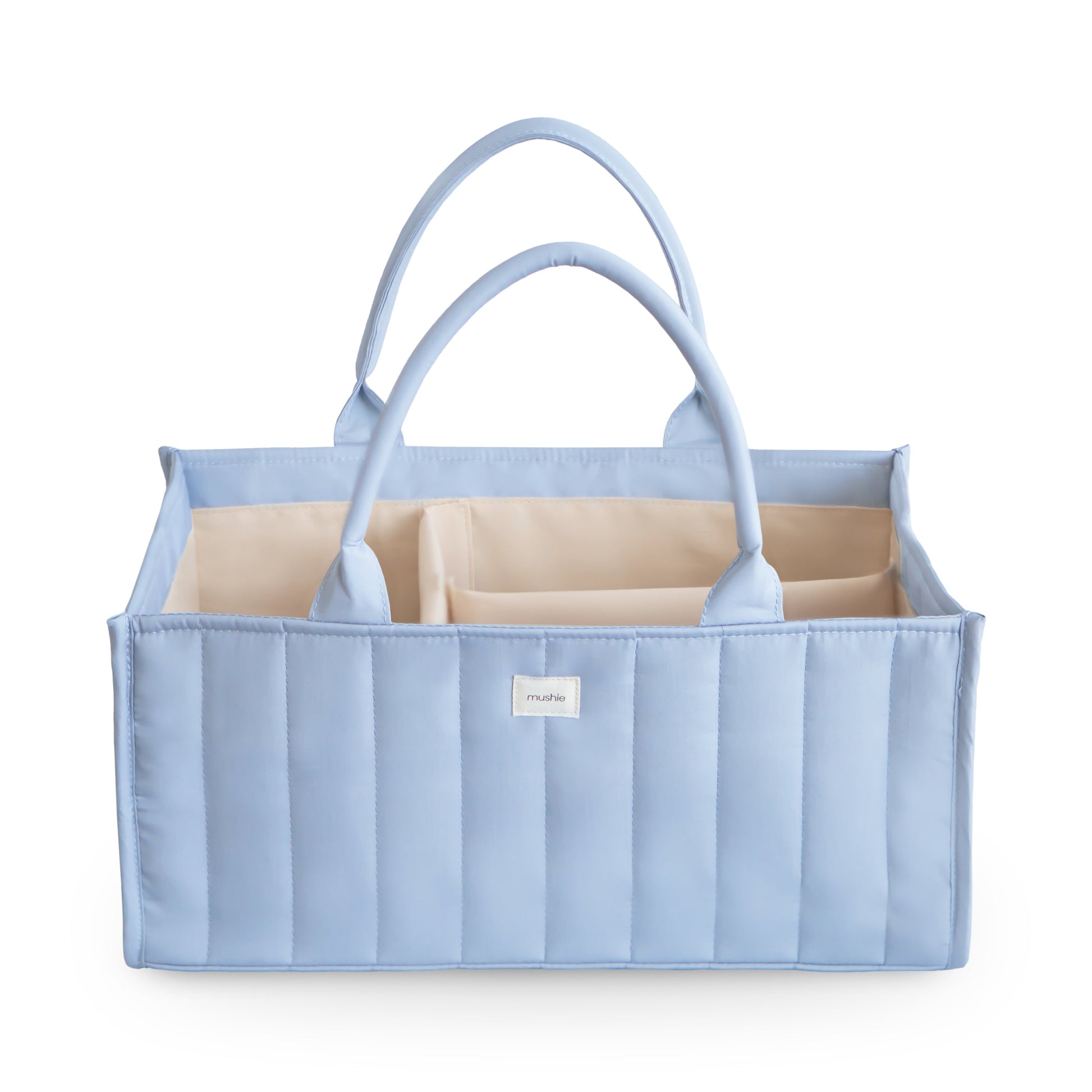 Blue striped tote bag with beige interior on a white background