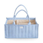 Blue striped tote bag with beige interior on a white background