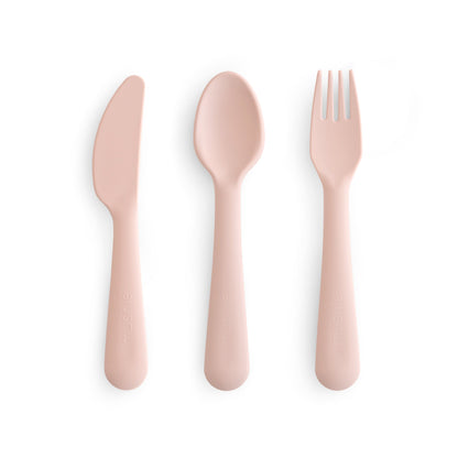 Set of pink cutlery including a knife, spoon, and fork on a white background