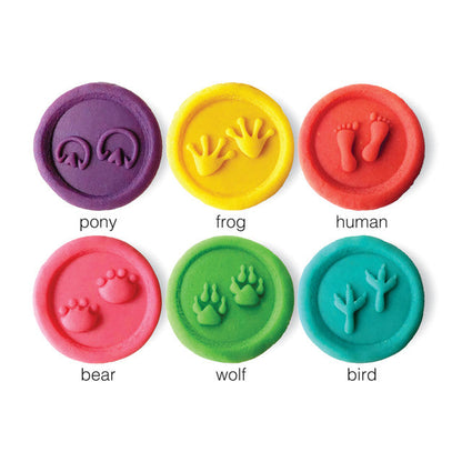 Set of colorful stampers with animal and human footprints on a white background