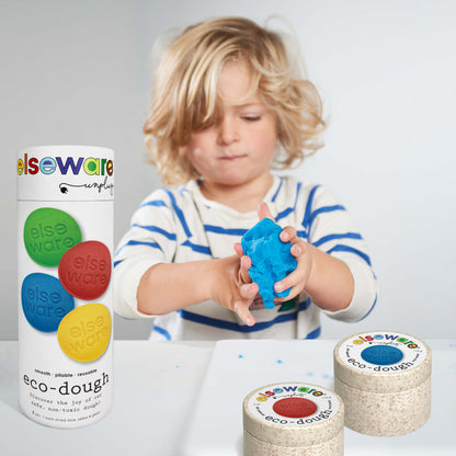 Child playing with eco-dough containers and a large container labeled 'elseware' on a white background.