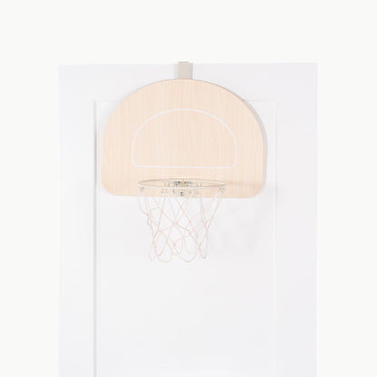 Beige basketball backboard with hoop on a white background