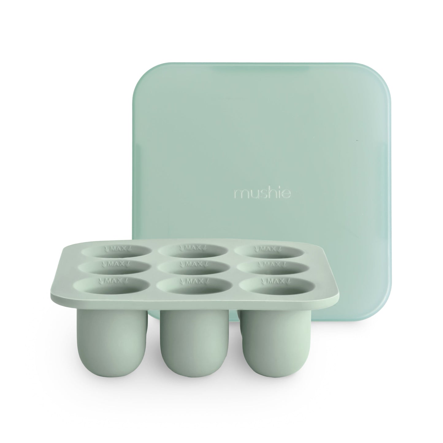 Mint green silicone ice cube tray with lid on a white background