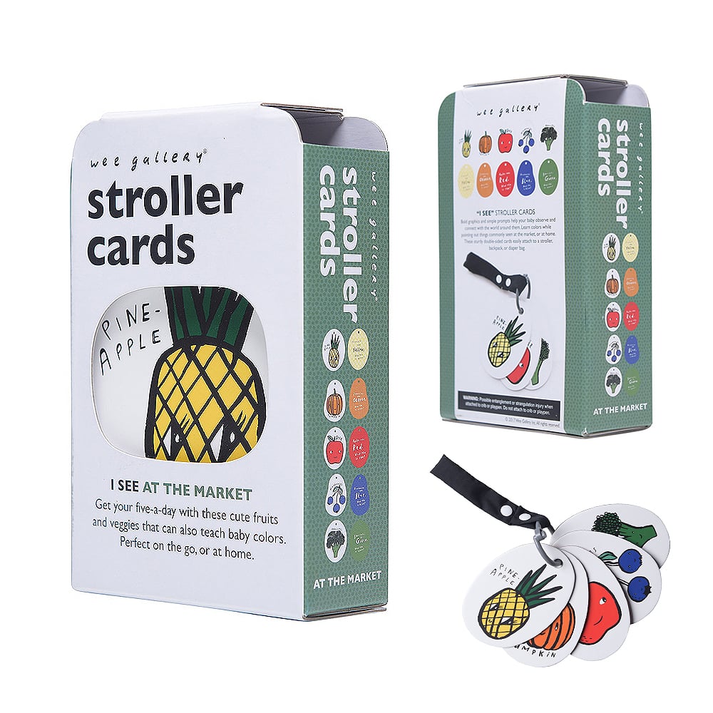 Stroller cards packaging with pineapple illustration and colorful cards on a white background