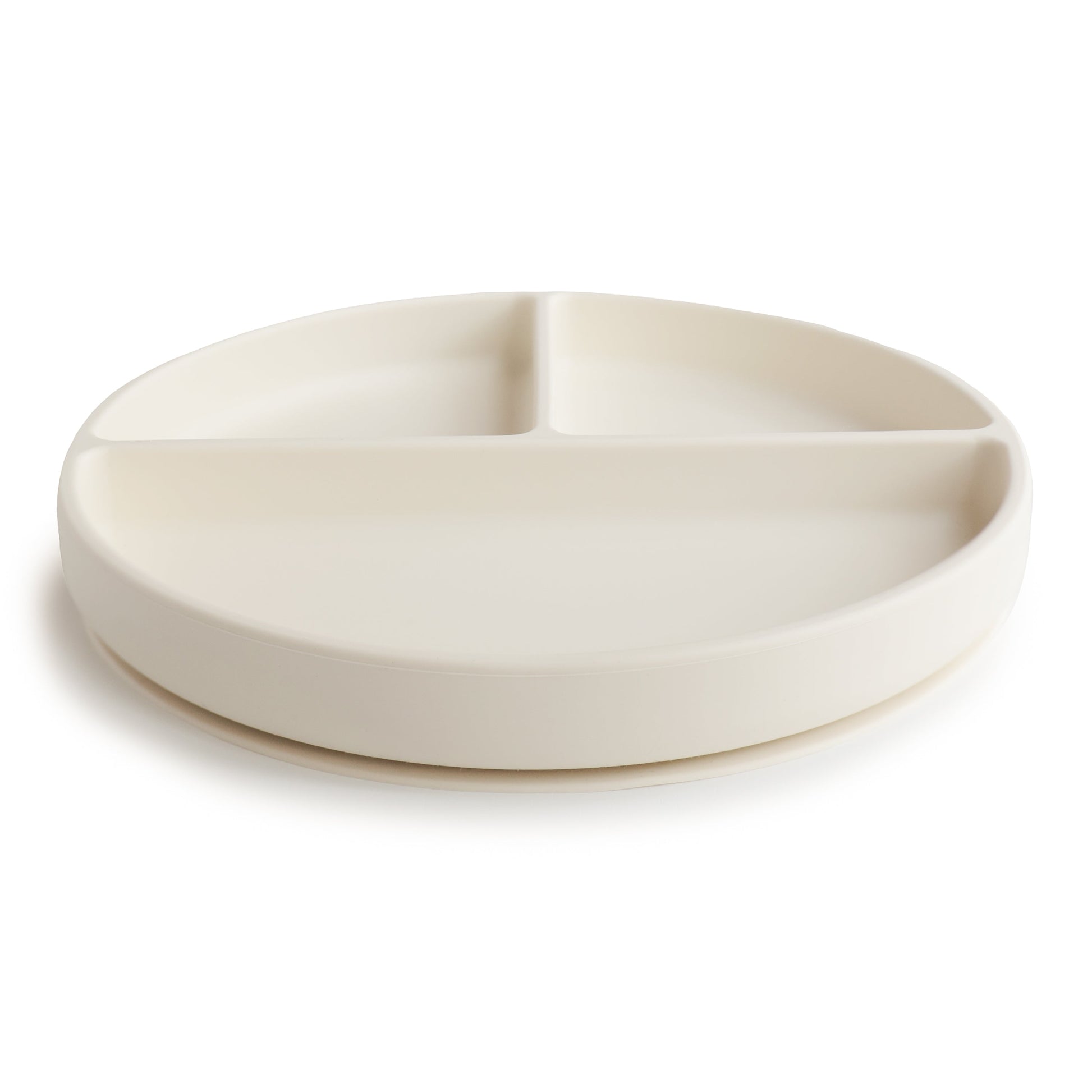 White ceramic dish with three sections on a white background