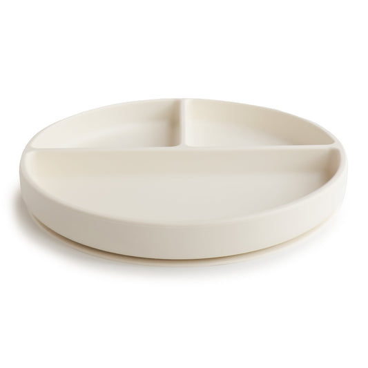 White ceramic dish with three sections on a white background