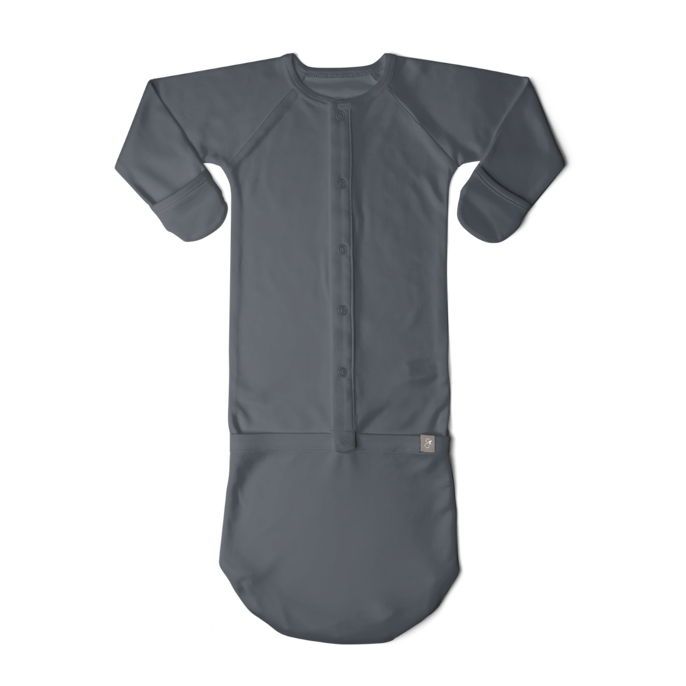 Gray baby gown with buttons on a white background
