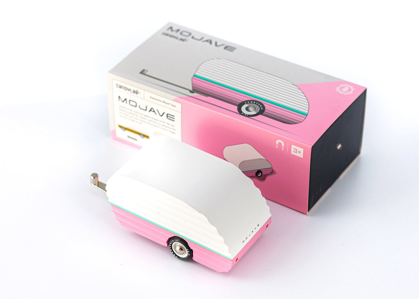Pink and white hair straightener with MOJAVE packaging on a white background