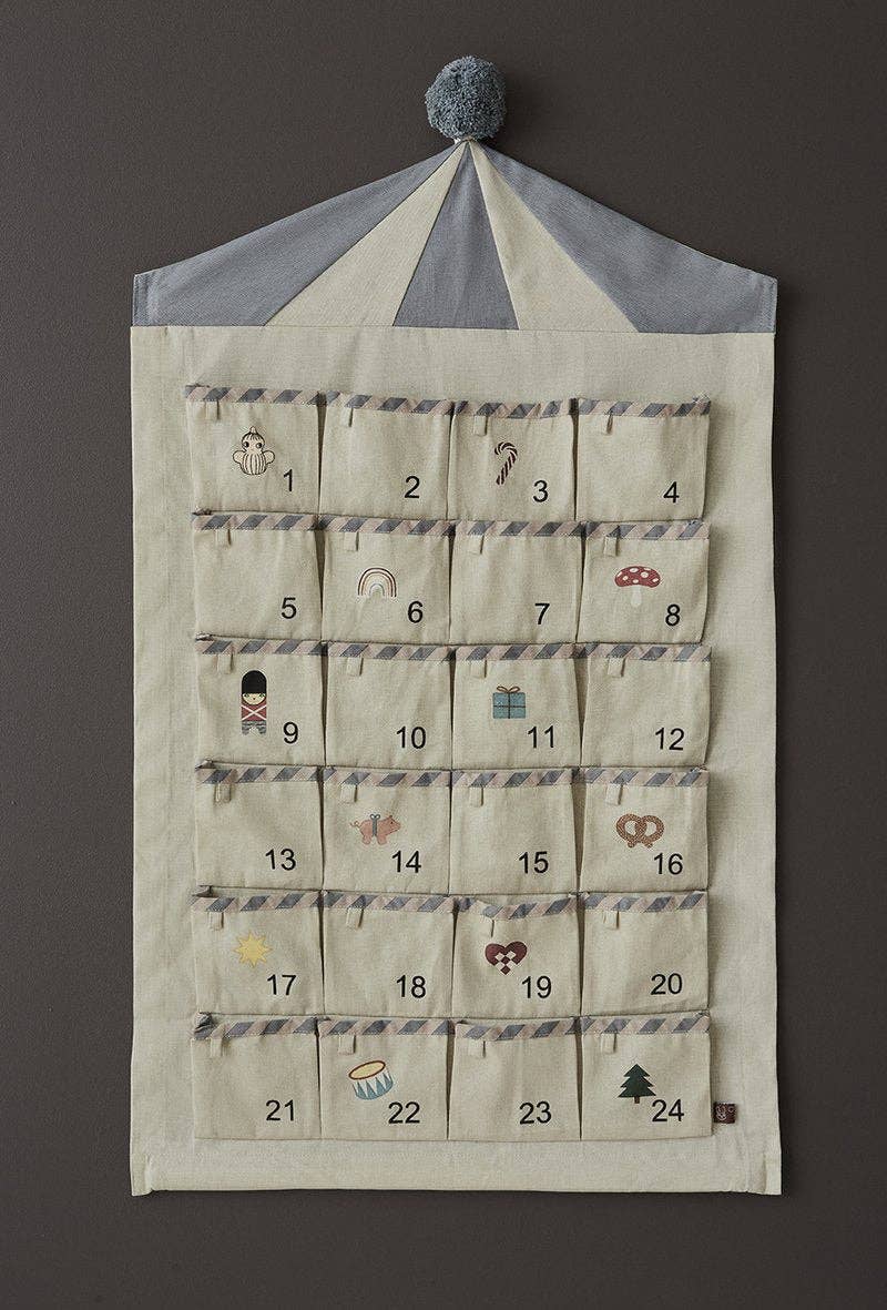 Fabric advent calendar with numbered days on a dark background
