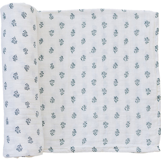 White fabric with small green floral pattern