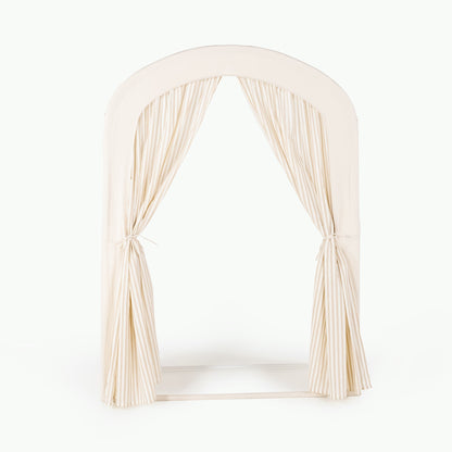 Beige archway with draped fabric on a white background