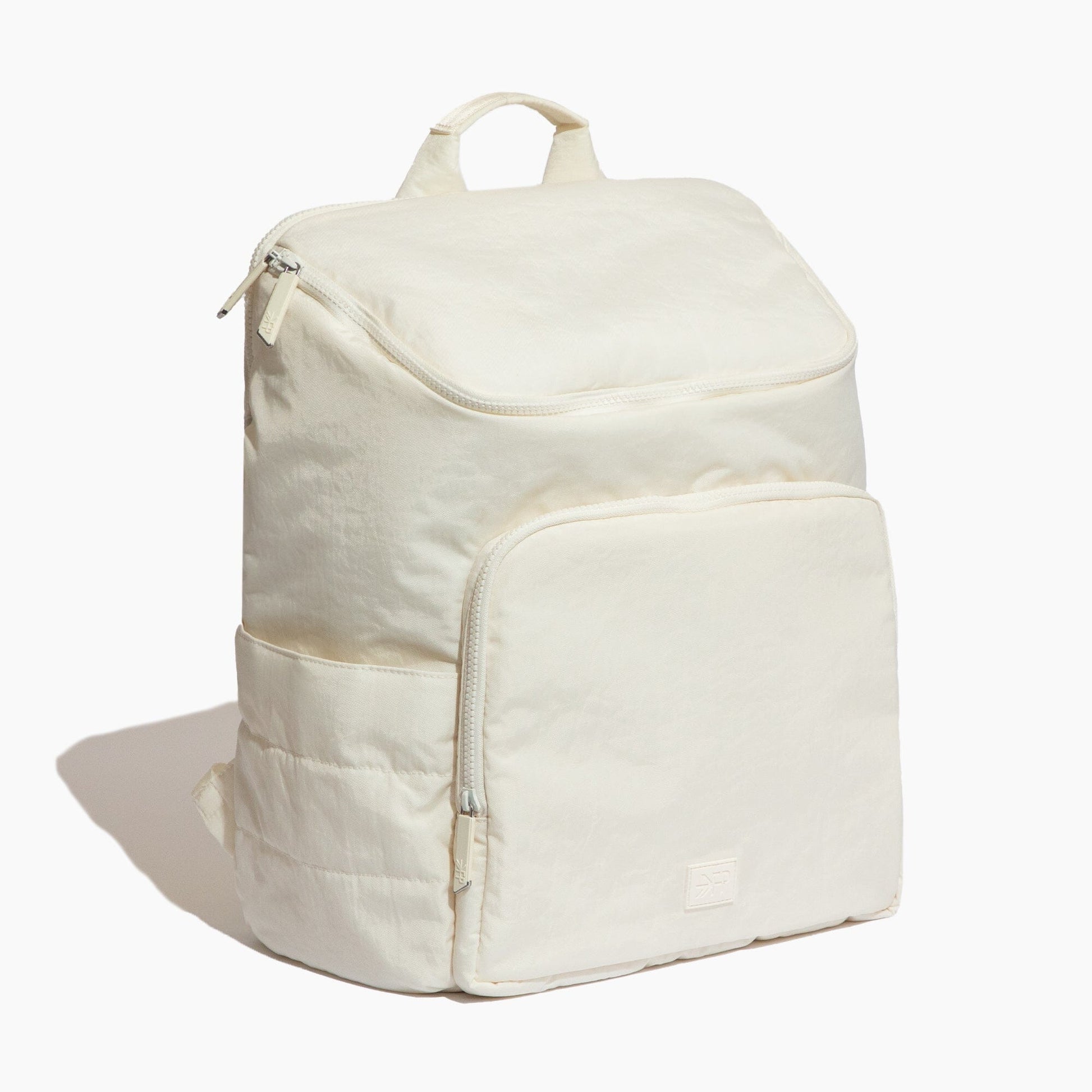 Beige backpack on a white background