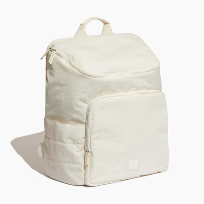 Beige backpack on a white background
