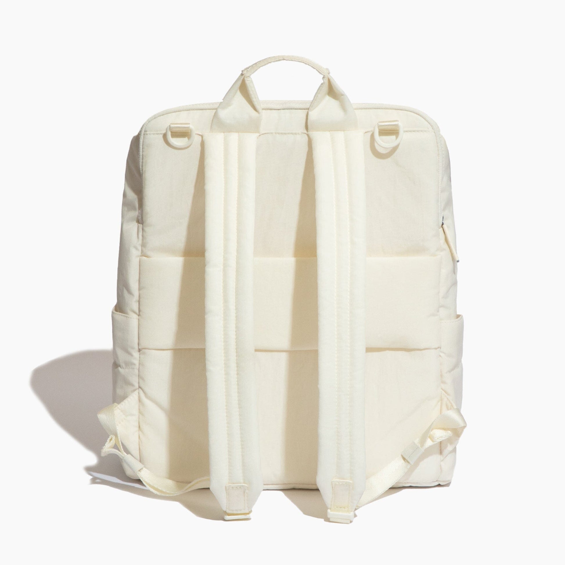 White backpack shown from the back on a white background