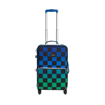 Checkered suitcase with blue and green pattern on a white background