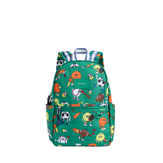 Green backpack with colorful cartoon character pattern on a white background