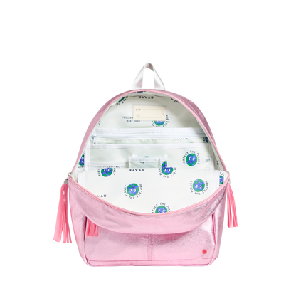 Pink backpack with tassels and a patterned interior on a white background